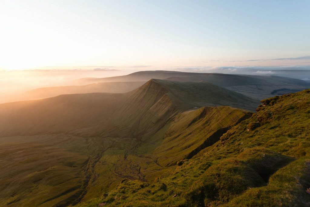 Pen-y-Fan glinting at sunrise in the Brecon Beacons